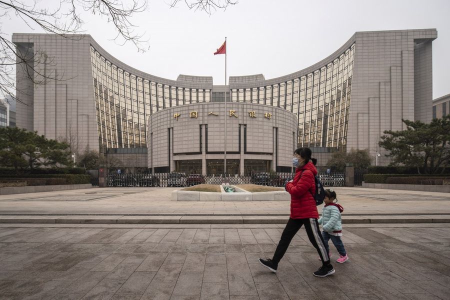 China trims lending rates again